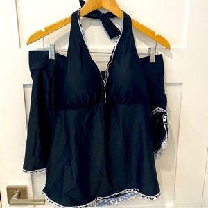 Brand new 2 pc bathing suit. Skort with Tankini. Black with white ruffle.